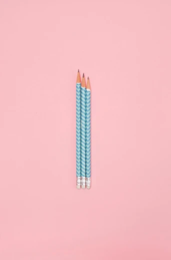 two blue pencils on a pink background, by Lubin Baugin, optical illusion, aquamarine, 1 3 5 mm, multiple lights, threes