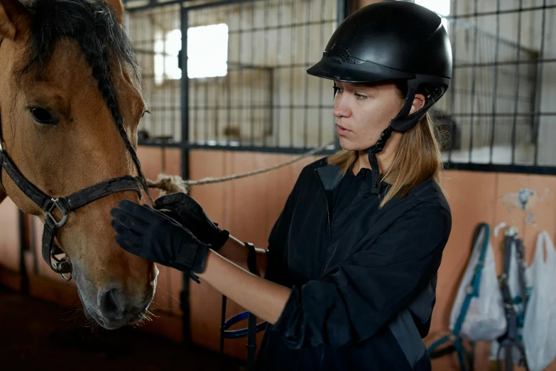 a woman wearing a helmet petting a horse, pexels contest winner, inspect in inventory image, black, working hard, rectangle