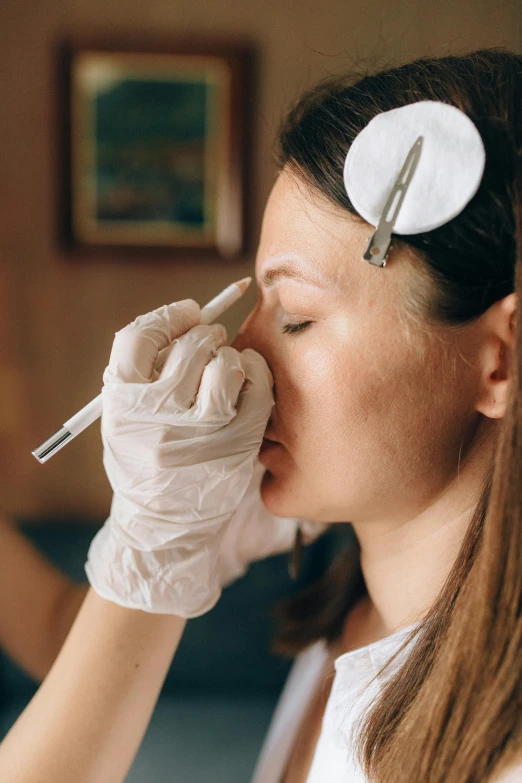 a woman with a pair of scissors on her nose, an airbrush painting, trending on pexels, brown, surgeon, relaxed eyebrows, inking