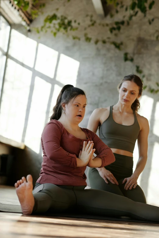 two women sitting on the floor doing yoga, trending on pexels, renaissance, an overweight, looking left, centered in image, lane brown