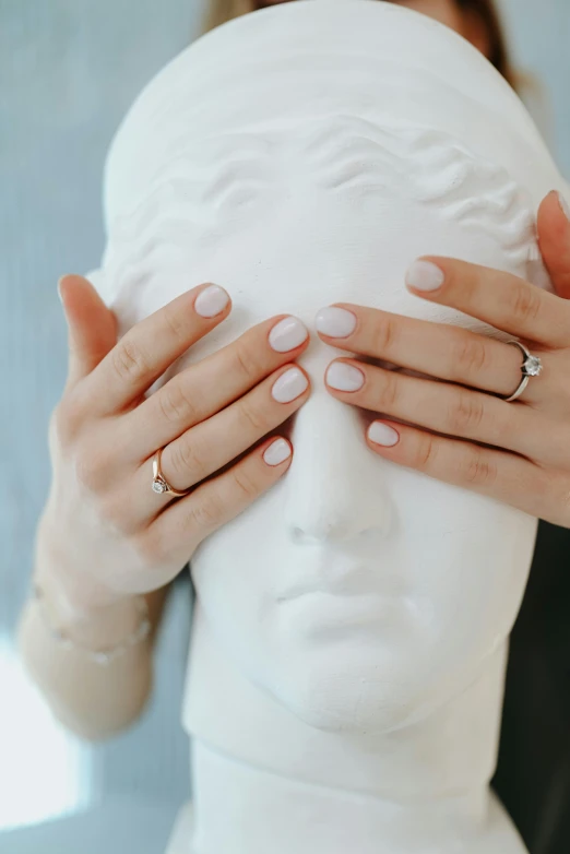 a woman covering her eyes with her hands, a marble sculpture, inspired by Antonio Canova, nails, curated collection, no - text no - logo, covered