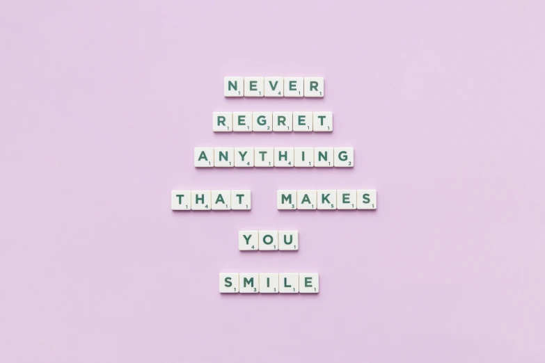 the words never regret anything that makes you smile, trending on pexels, aestheticism, pixel degradation, instagram post, inspirational quote, on a pale background