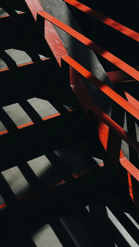 a red bench sitting on top of a set of stairs, inspired by Alexander Rodchenko, unsplash contest winner, detail structure, dark grey and orange colours, strong shadows), 15081959 21121991 01012000 4k