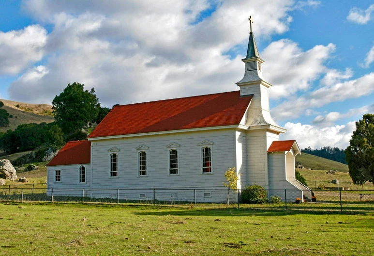 a small white church with a red roof, by David Simpson, pexels, square, new zeeland, napa, brown