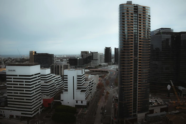 a view of a city from a high rise building, pexels contest winner, hyperrealism, north melbourne street, low quality photo, no people, slight overcast