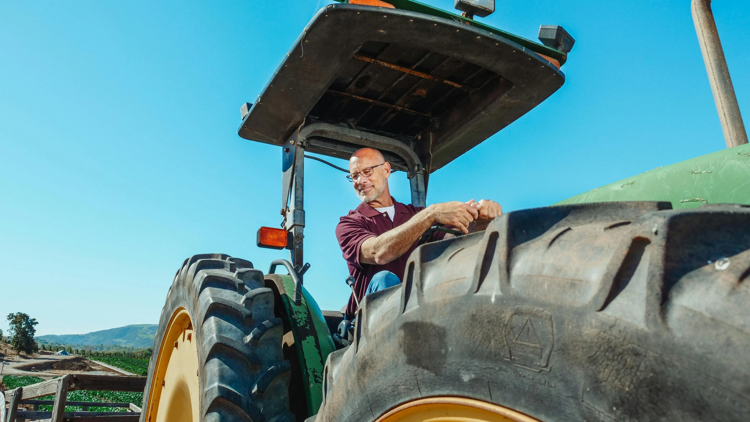 a man sitting in the driver's seat of a tractor, pexels contest winner, 15081959 21121991 01012000 4k, schools, worksafe. instagram photo, avatar image