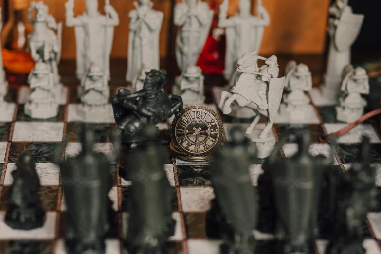 a chess board with a lot of chess pieces on it, a statue, by Adam Marczyński, unsplash contest winner, celtic norse frankish, miniature porcelain model, thumbnail, taken on iphone 14 pro