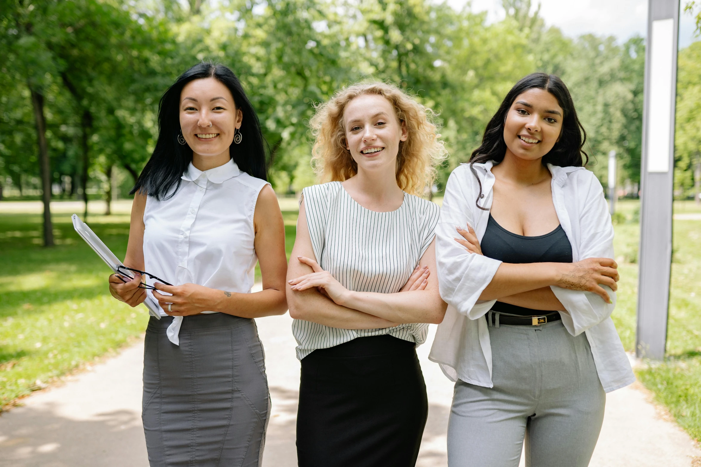 a group of three women standing next to each other, pexels contest winner, female in office dress, sydney park, avatar image