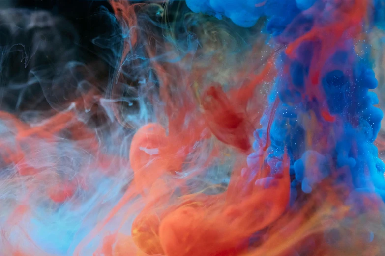 a close up of a red and blue substance, inspired by Kim Keever, pexels, liquid smoke, beeple and james jean, multicoloured, a still of an ethereal