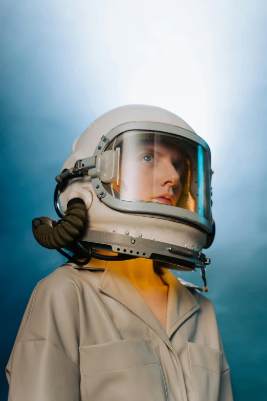 a close up of a person wearing a helmet, by Adam Marczyński, light and space, pilot girl, chemistry, helmet instead of a head, looking at the sky