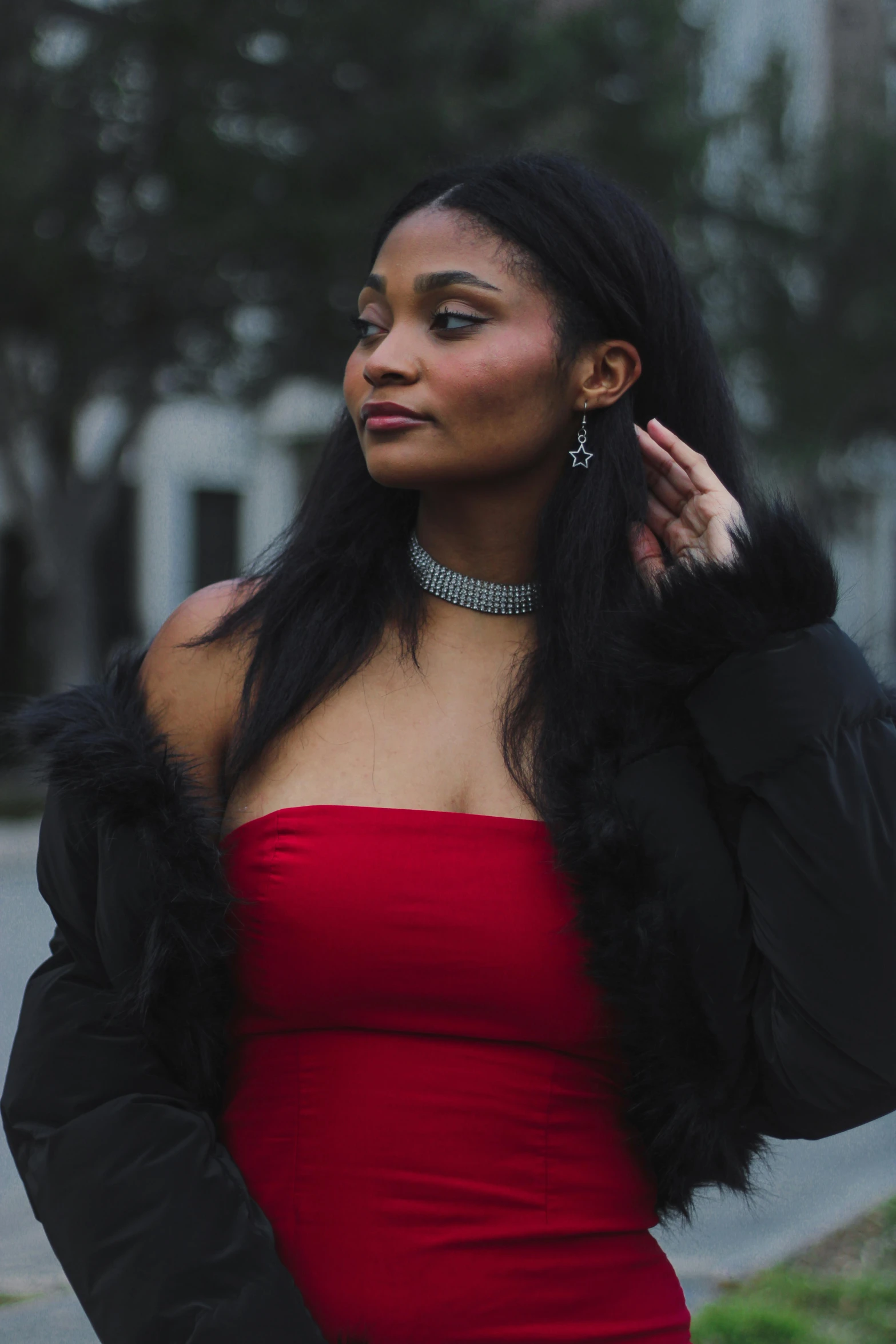 a woman in a red dress and black jacket, trending on pexels, wearing choker, young black woman, instagram photo, promo image