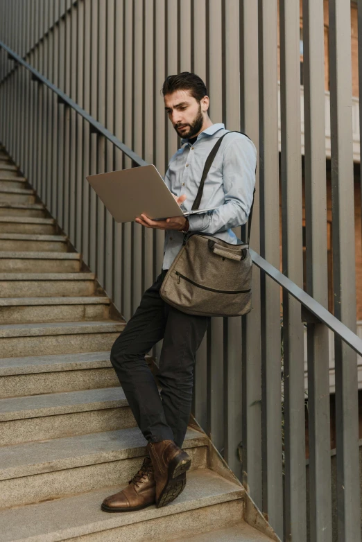 a man sitting on a set of stairs using a laptop, trending on reddit, renaissance, carrying a saddle bag, ready for a meeting, profile image, taupe