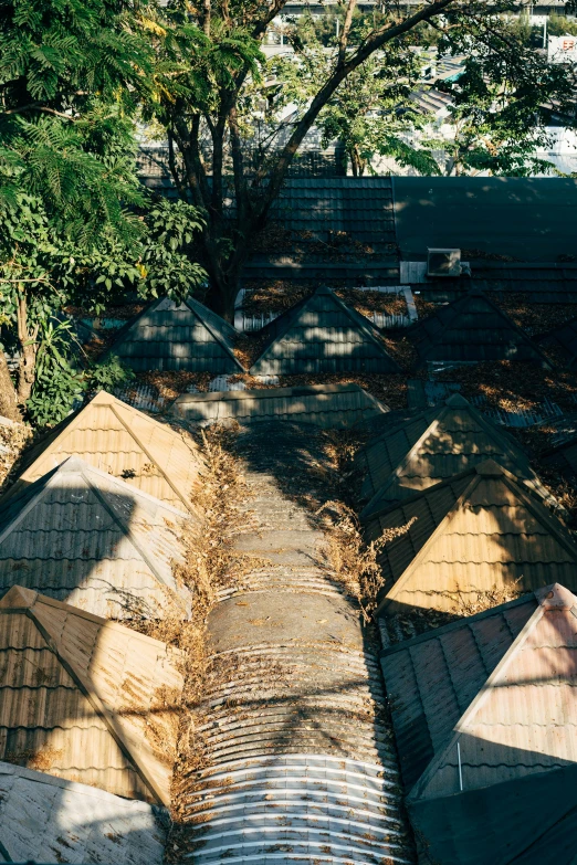 a bird's eye view of the roof of a house, an album cover, unsplash, land art, dusty abandoned shinjuku, gravestones, shady alleys, high quality photo