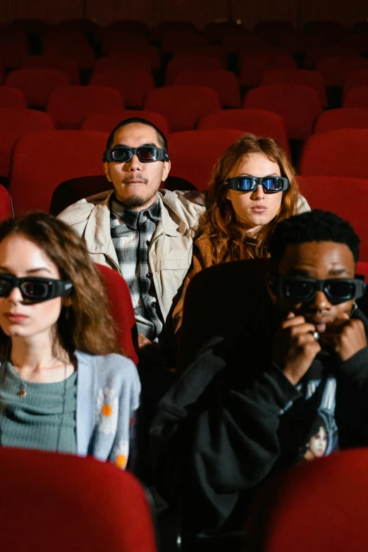 a group of people sitting in a theater wearing 3d glasses, shutterstock, hyperrealism, instagram post, diverse, movie cover, adult