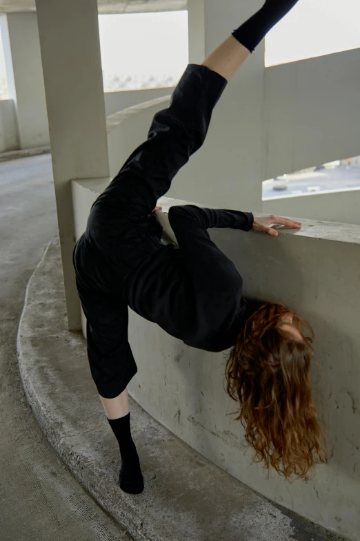 a woman is doing a trick on a skateboard, inspired by Elizabeth Polunin, leaning against the wall, issey miyake, profile image, contorted