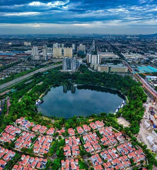 an aerial view of a city with a lake, by Basuki Abdullah, pexels contest winner, photorealism, wide angle shot 4 k hdr, shan shui, composite, residential area