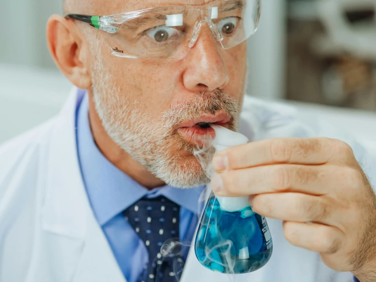 a close up of a person in a lab coat, cold breath, pouring techniques, blippi, short white beard