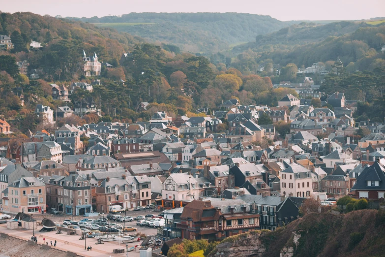 a view of a town from the top of a hill, by Raphaël Collin, pexels contest winner, art nouveau, omaha beach, french village exterior, alana fletcher, dezeen