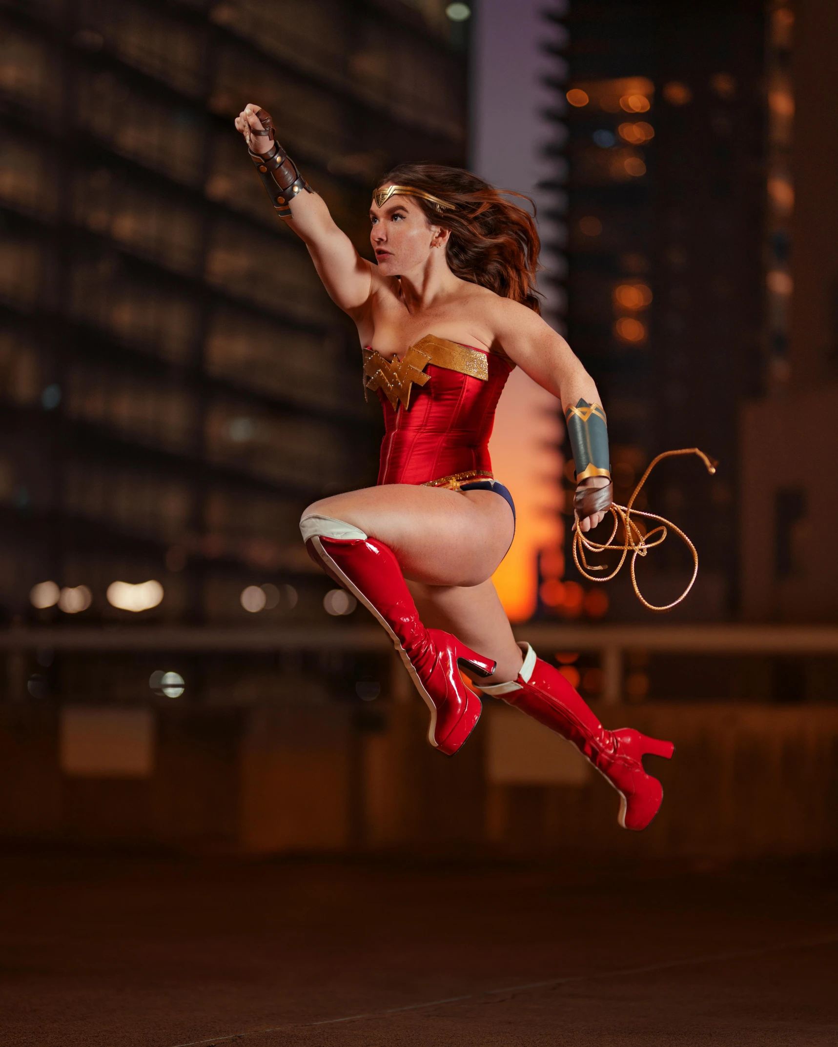 a woman in a costume jumping in the air, by Jason Felix, face like gal gadot, nsfw, viral photo, lasso