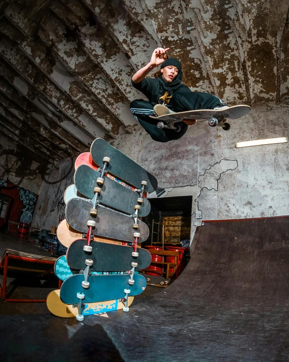 a man flying through the air while riding a skateboard, a portrait, unsplash, thumbnail, low quality photo, wenjun lin, lachlan bailey