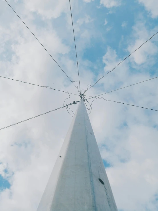 a tall pole with wires on top of it, an album cover, unsplash, trending on vsco, profile image, pov photo, antennae