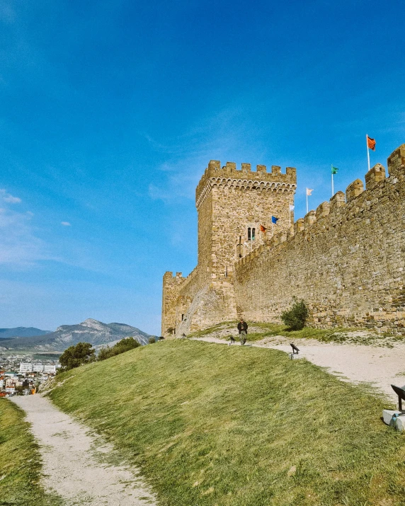 a castle sitting on top of a lush green hillside, an album cover, pexels contest winner, graffiti, mediterranean city, square, museum photo, thumbnail