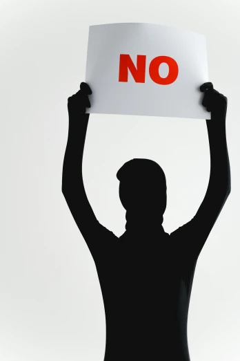 a person holding a sign that says no, shutterstock, neoism, silhoutte, no nudity, no - text no - logo, press shot