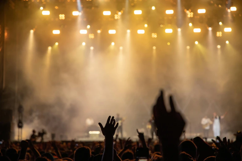 a crowd of people at a concert with their hands in the air, pexels contest winner, figuration libre, thumbnail, zoomed in shots, profile image, getty images