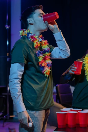 a couple of men standing next to each other on top of a table, by Alice Mason, unsplash, in costume, drinking their hearts out, performing on stage, tropical