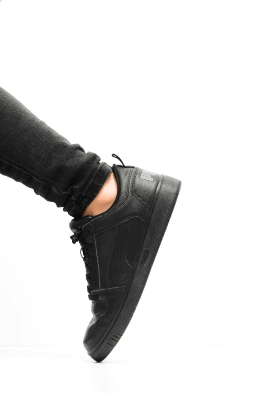 a close up of a person wearing black shoes, trending on pexels, view(full body + zoomed out), based on a puma, detailed photoreal, thin young male