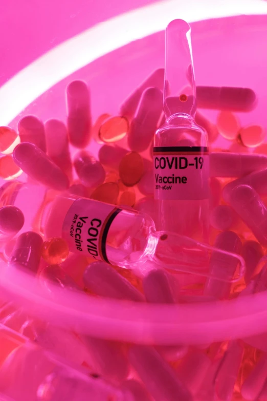 a pink bowl filled with pills and vials, a picture, by Tony Szczudlo, covid-19 as a human, up-close, thumbnail, ships