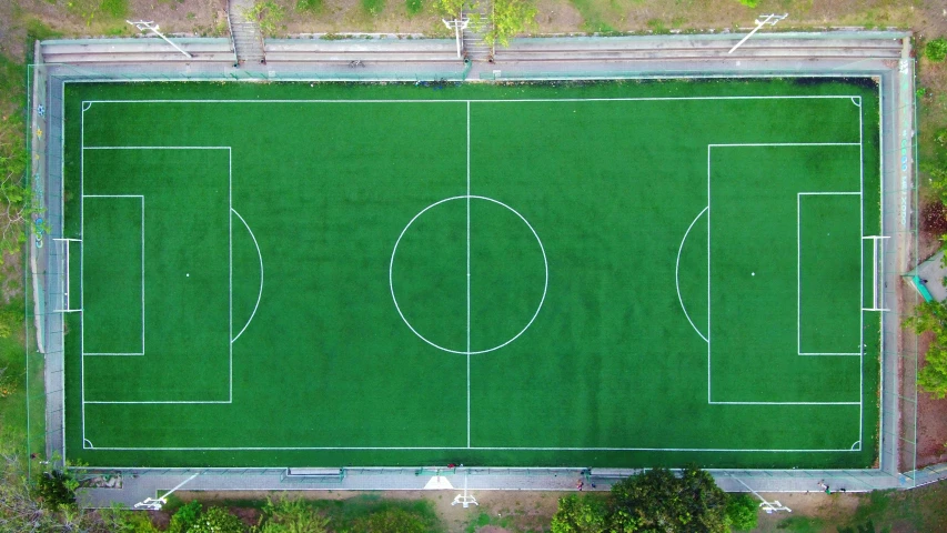 an aerial view of a soccer field, by Dan Content, unsplash contest winner, conceptual art, sangyeob park, 15081959 21121991 01012000 4k, minimal composition, private school