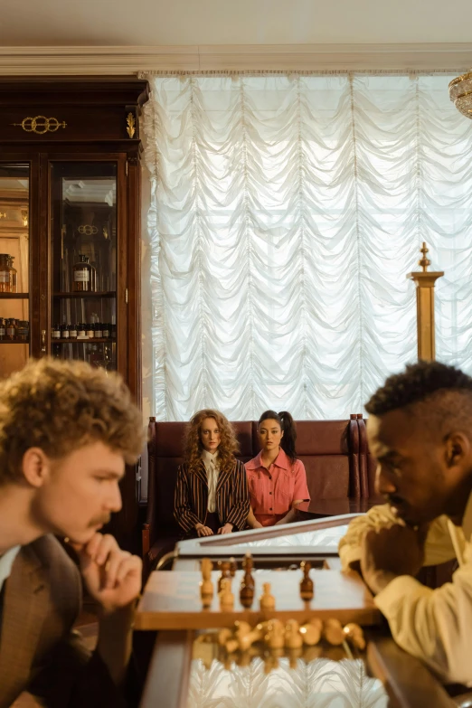 a group of people playing a game of chess, an album cover, trending on unsplash, renaissance, inside a french cafe, alexander abdulov, portrait shot 8 k, ( ( theatrical ) )