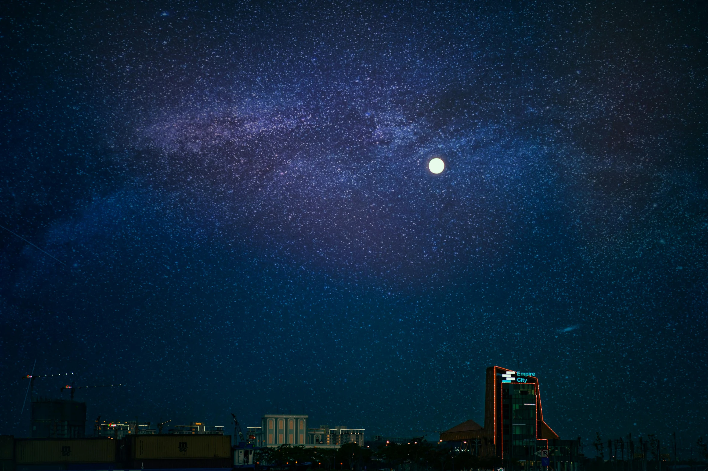 a city at night with a full moon in the sky, by Washington Allston, pexels contest winner, magical realism, milkyway, well lit night in las vegas, minimal composition, city rooftop