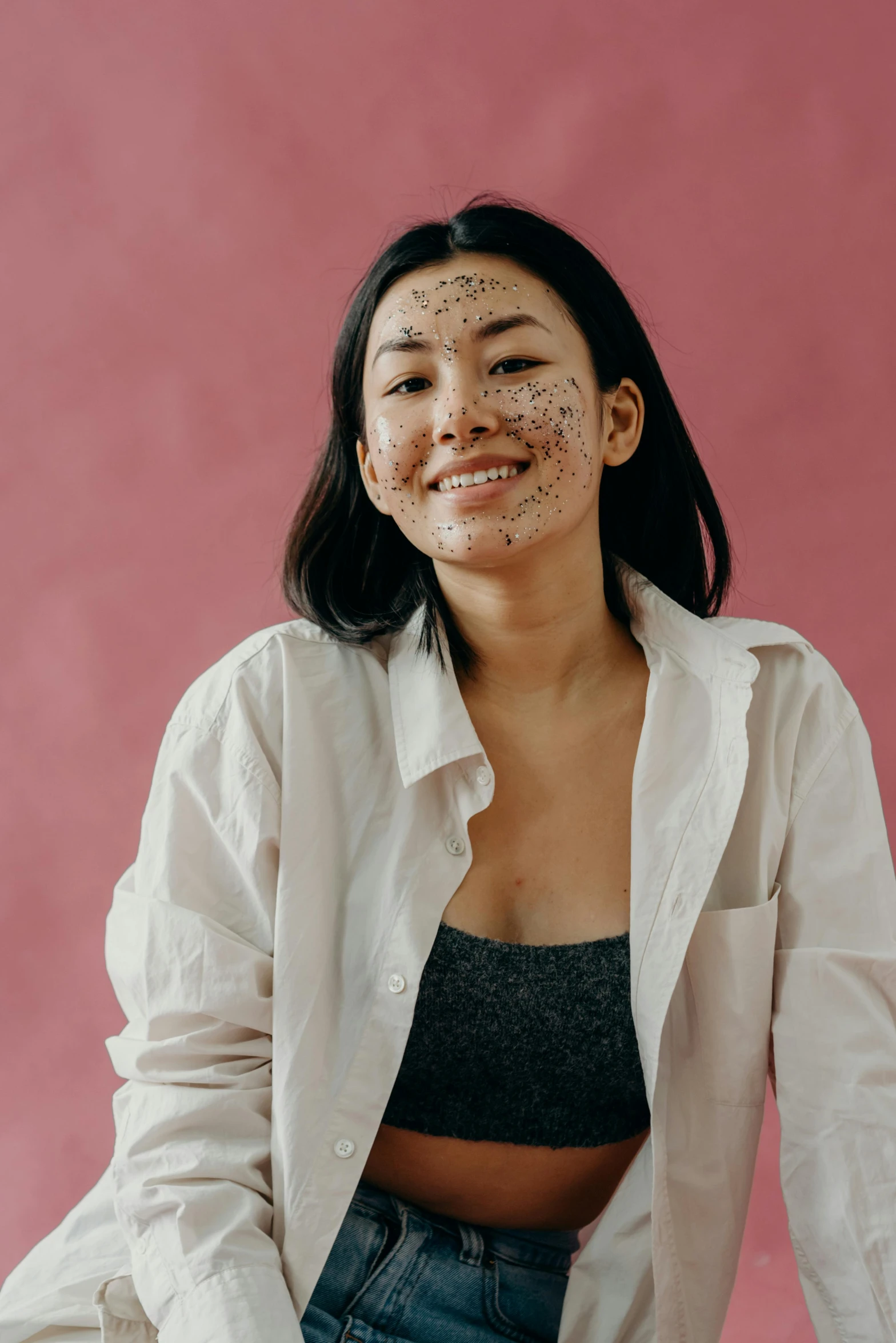 a woman with dirt all over her face, trending on pexels, mingei, young asian woman, made of dots, delightful, skincare