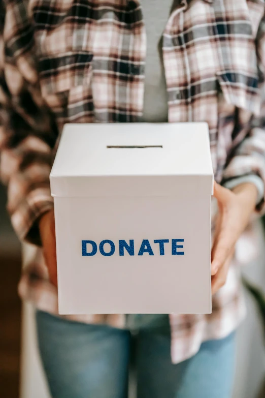 a woman holding a donation box, pexels contest winner, renaissance, thumbnail, white, large)}], single light