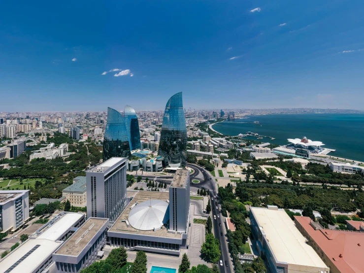 a view of a city from the top of a building, an album cover, by Arthur Sarkissian, pexels contest winner, hurufiyya, 4k panoramic, three towers, located in hajibektash complex, aerial