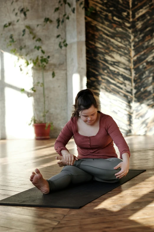 a woman sitting on a yoga mat in a room, pexels contest winner, renaissance, bending down slightly, hammershøi, profile image, square