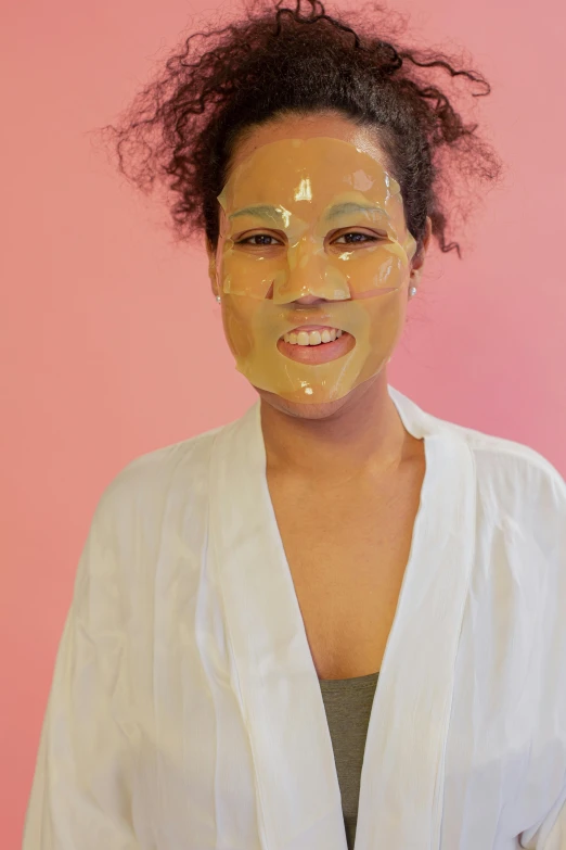 a woman with a sheet mask on her face, by Ellen Gallagher, light skinned african young girl, wearing honey, green colored skin, silicone skin