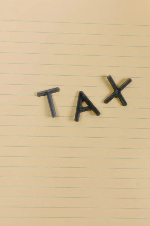 a notepad with the word tax written on it, by artist, promo photo, tan, 1 6 x 1 6, medium close-up