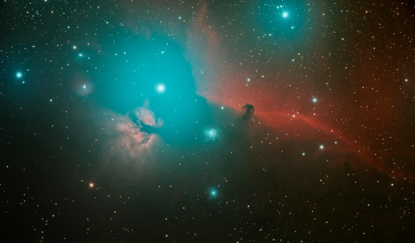 a star filled sky filled with lots of stars, a colorized photo, by David Donaldson, unsplash contest winner, light and space, red green black teal, cloud nebula, london, eel nebula