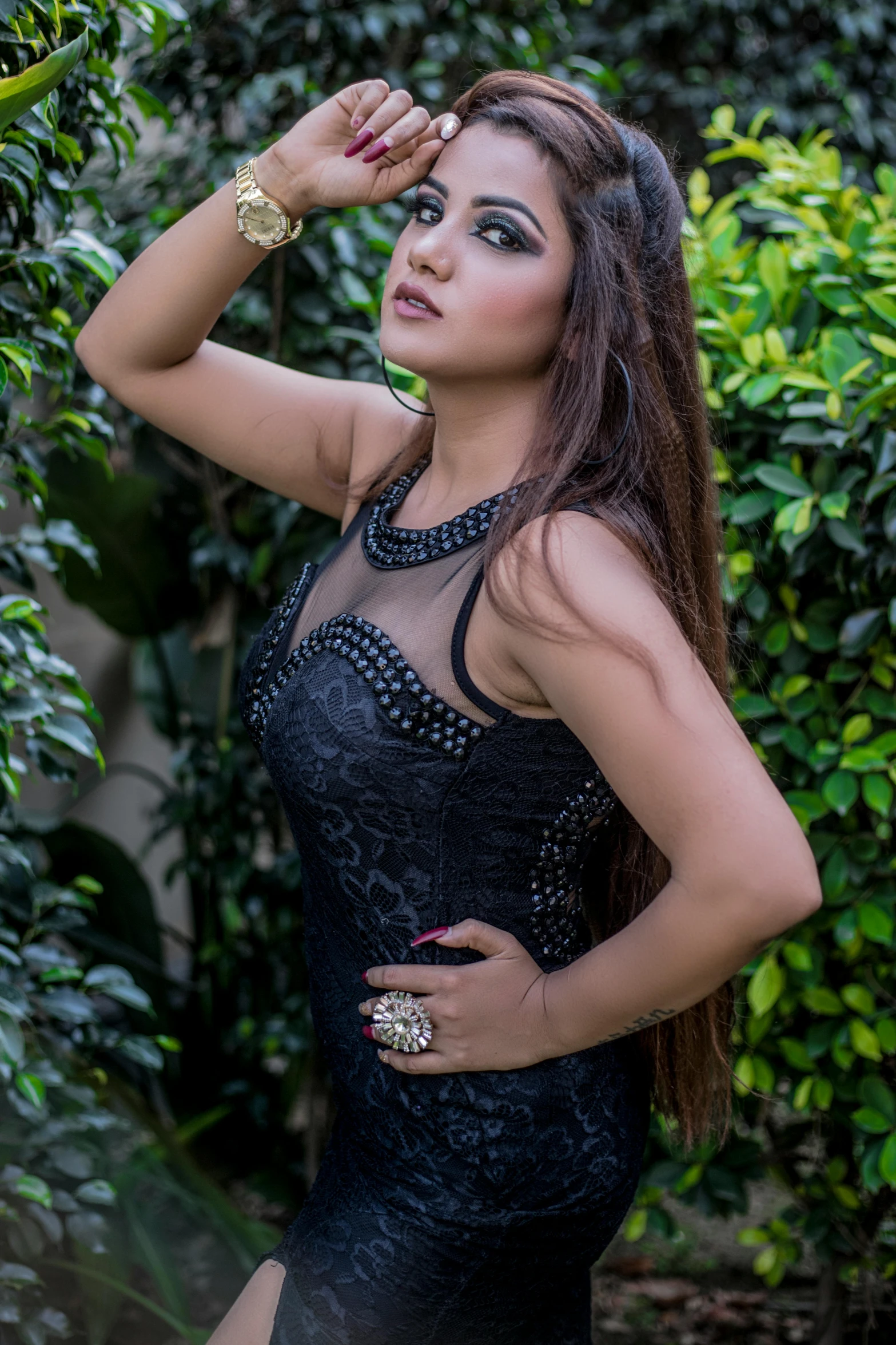 a beautiful young woman posing in a black dress, by reyna rochin, kyza saleem, portait image