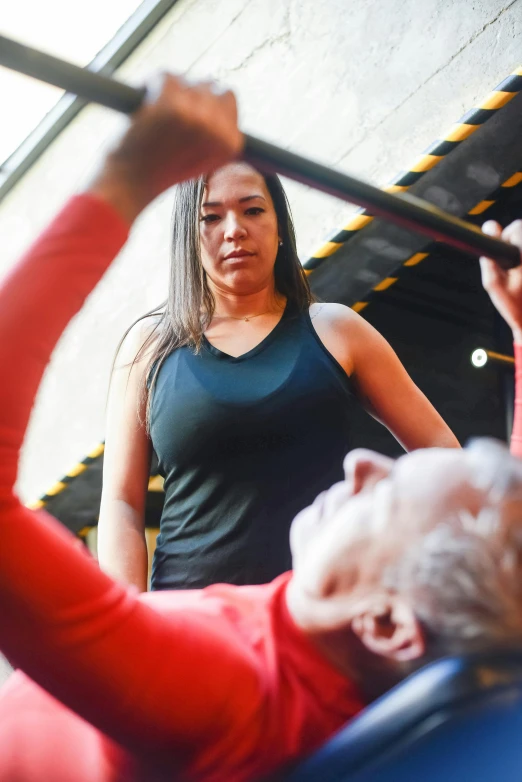 an older woman working out with a personal trainer, a portrait, by Julian Allen, pexels contest winner, practising her sword staces, asian female, head and shoulder shot, multi-part