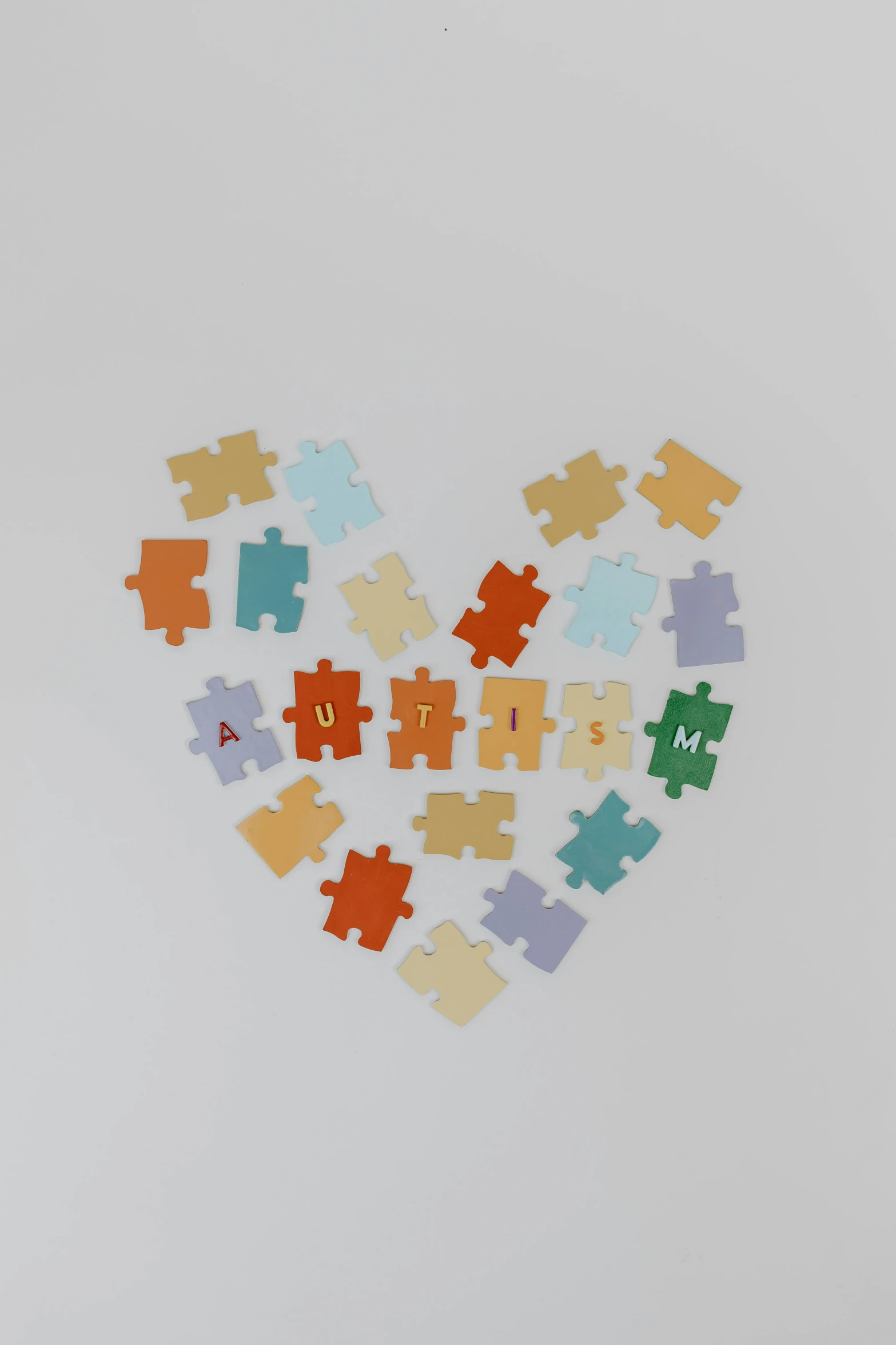 a heart made out of puzzle pieces, unsplash, letterism, 2 5 6 x 2 5 6, in muted colors, stickers, bears