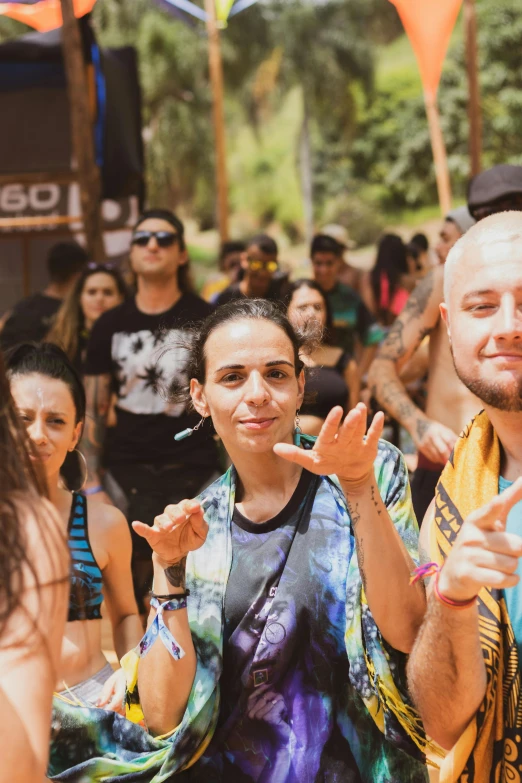 a group of people standing next to each other at a festival, junglecore, profile image, highly upvoted, fernanda suarez