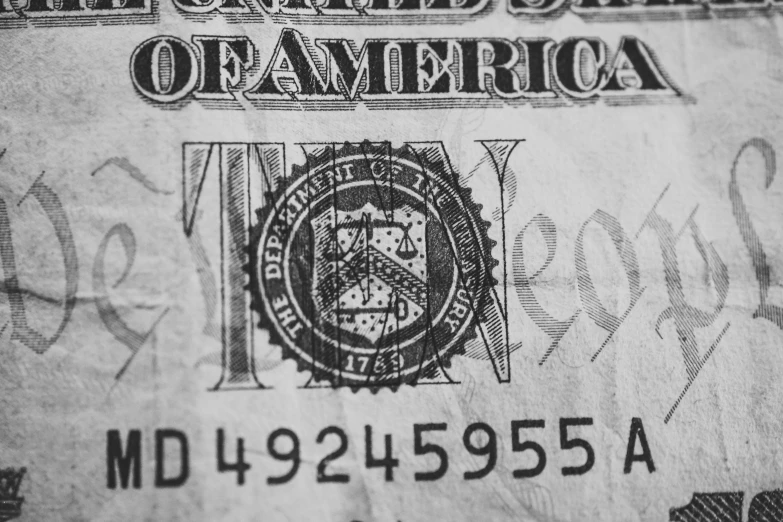 a close up of a one hundred dollar bill, a black and white photo, by Adam Rex, pexels, fluxus, the seal of fortune, 1 9 4 8 photo, 🦑 design, fbi