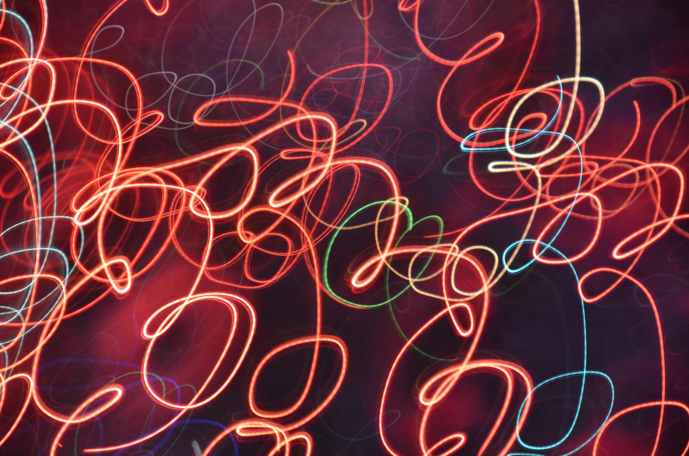 a blurry photo of a bunch of lights, pexels, generative art, red writing, swirles, scribbled lines, abstract claymation