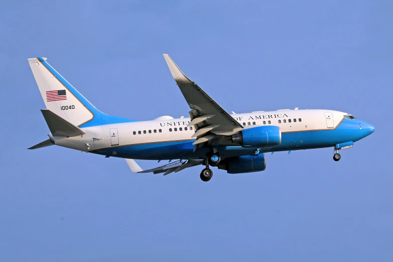 a large jetliner flying through a blue sky, by Dan Luvisi, flickr, hurufiyya, mike pence, avatar image, portrait photo, image