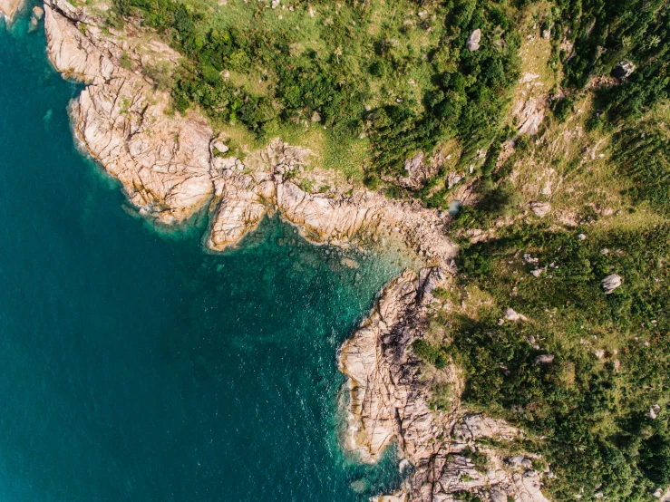 an aerial view of a large body of water, a screenshot, pexels contest winner, on a cliff, abel tasman, an exquisite 3 d map, thumbnail