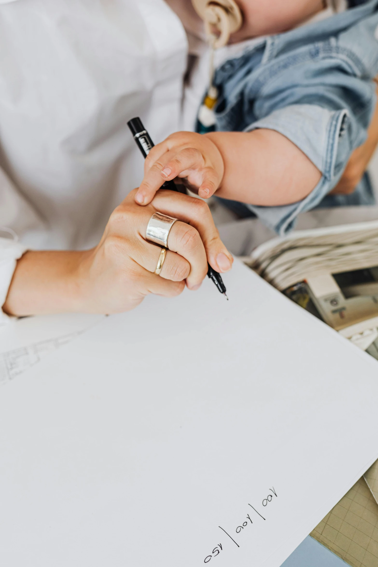 a woman sitting at a desk writing on a piece of paper, a child's drawing, by Nicolette Macnamara, pexels contest winner, black ball pen on white paper, sleek hands, banner, craftsmanship